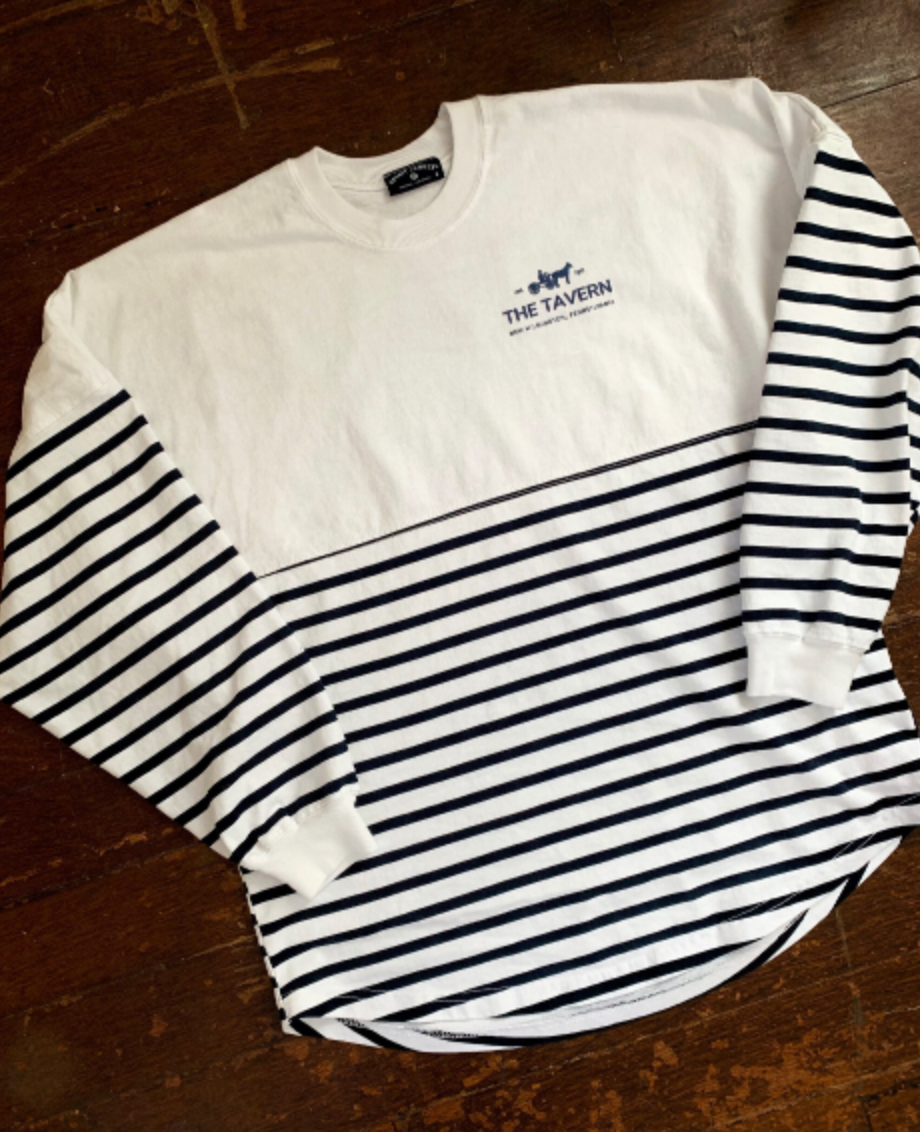 Sweatshirt? Longsleeve shirt? Both? Whatever you call it, it is the most comfortable shirt we’ve worn! The perfect weight for cool nights, The Tavern Spirit Jersey is a great all season piece and a new wardrobe staple.  Details & Care: Navy and White. 100% preshrunk cotton. Machine wash and tumble dry low or air dry.  Fit: Dropped shoulders, banded neckline and curved hem. Looks good on everyone with a roomy fit.